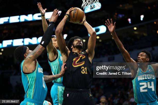 Jarrett Allen of the Cleveland Cavaliers attempts a shot against the Charlotte Hornets during the second half of the game at Spectrum Center on March...