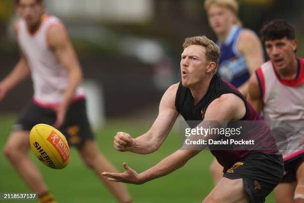 James Sicily of the Hawks in action during a Hawthorn Hawks AFL training session at Waverley Park on March 28, 2024 in Melbourne, Australia.