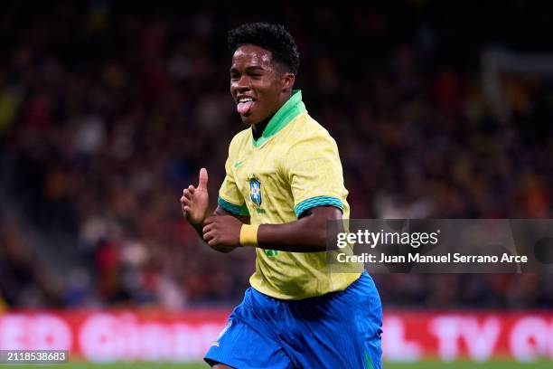 Endrick Felipe of Brazil celebrates after scoring his team's second goal during the friendly match between Spain and Brazil at Estadio Santiago...