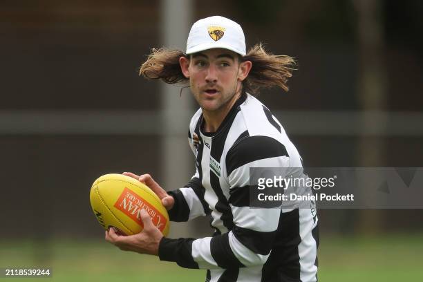 Jai Newcombe of the Hawks in action during a Hawthorn Hawks AFL training session at Waverley Park on March 28, 2024 in Melbourne, Australia.