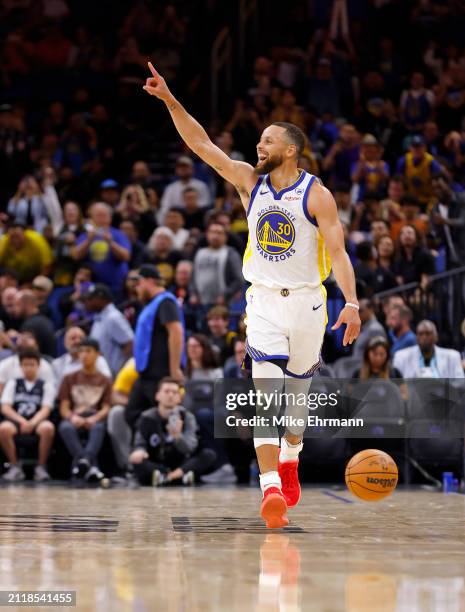 Stephen Curry of the Golden State Warriors reacts to winning a game against the Orlando Magic at Kia Center on March 27, 2024 in Orlando, Florida....