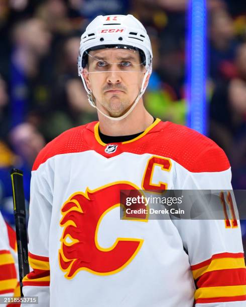 Mikael Backlund of the Calgary Flames waits for a face-off during the first period of their NHL game against the Vancouver Canucks at Rogers Arena on...