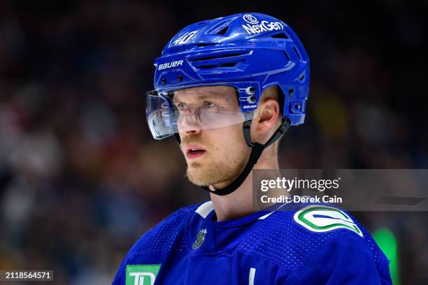 Elias Pettersson of the Vancouver Canucks waits for a face-off during the third period of their NHL game against the Calgary Flames at Rogers Arena...