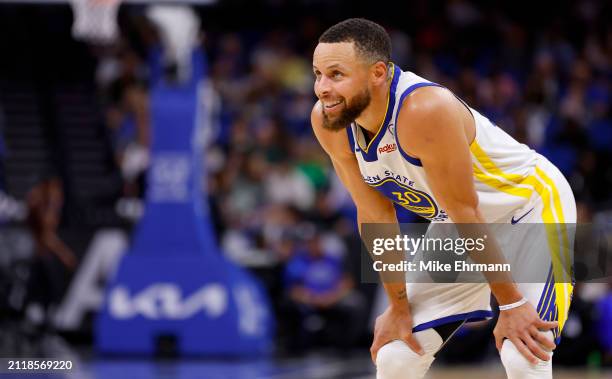 Stephen Curry of the Golden State Warriors looks on during a game against the Orlando Magic at Kia Center on March 27, 2024 in Orlando, Florida. NOTE...