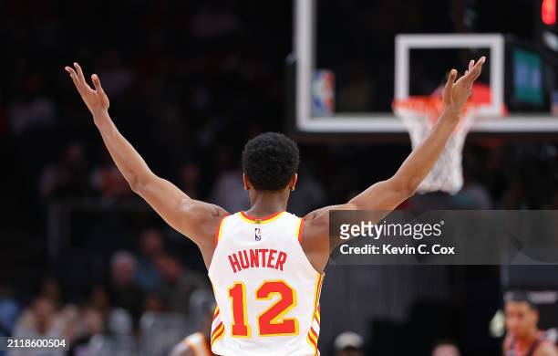 De'Andre Hunter of the Atlanta Hawks reacts after hitting a three-point basket against the Portland Trail Blazers during the first quarter at State...