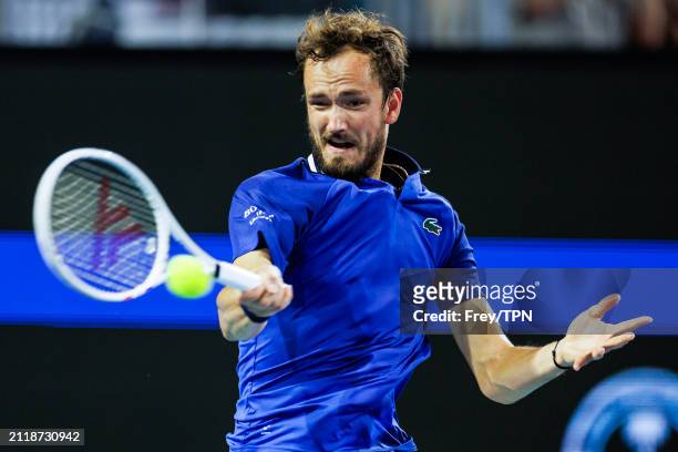 Daniil Medvedev of Russia hits a forehand against Nicolas Jarry of Chile in the quarterfinals of the Miami Open at the Hard Rock Stadium on March 27,...