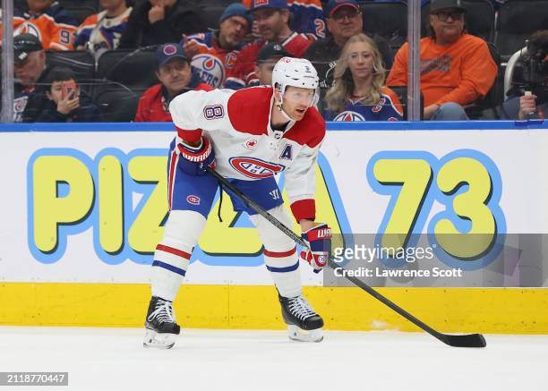 Mike Matheson of the Montreal Canadiens set for an offensive face off in the first period against the Edmonton Oilers on March 19, 2024 at Rogers...