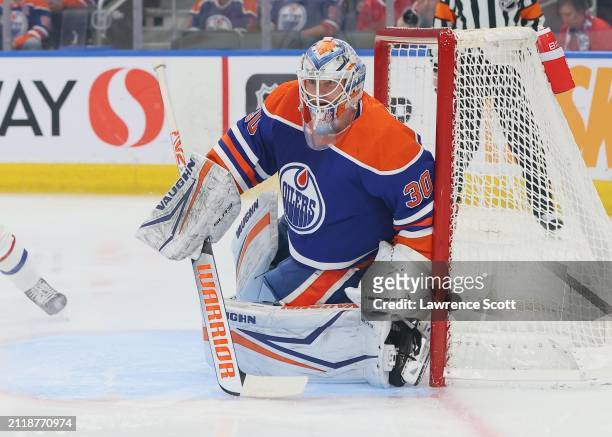 Calvin Pickard of the Edmonton Oilers set to makes a save in the first period against the Montreal Canadiens on March 19, 2024 at Rogers Place in...