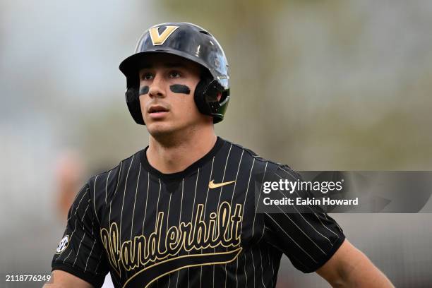 Jack Bulger of the Vanderbilt Commodores walks off the field after striking out against the South Carolina Gamecocks in the second inning during the...