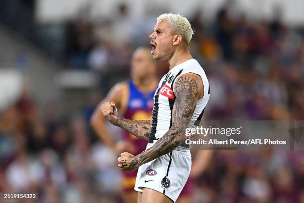 Bobby Hill of the Magpies celebrates kicking a goal during the round three AFL match between Brisbane Lions and Collingwood Magpies at The Gabba, on...
