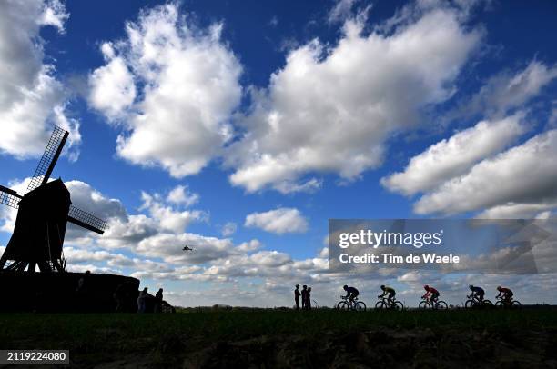 Silhouette of Stefan Kung of Switzerland and Team Groupama - FDJ, race winner Matteo Jorgenson of The United States and Team Visma | Lease a Bike,...