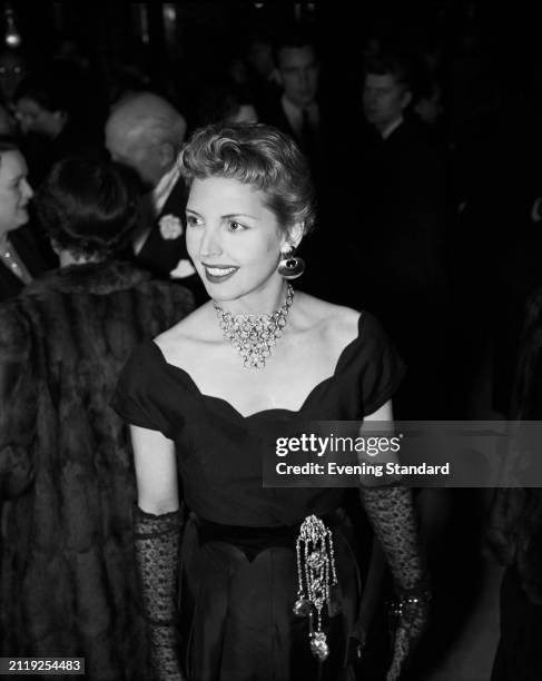 Scottish actress Hariette Johns wearing jewellery including a chatelaine, October 23rd 1953.