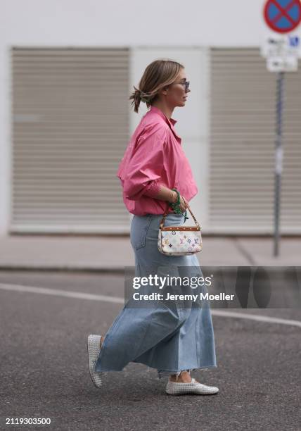 Karin Teigl seen wearing Rhude grey sunglasses, Christian Dior Sports pink vintage jacket, Agolde light blue denim long skirt, Louis Vuitton white...