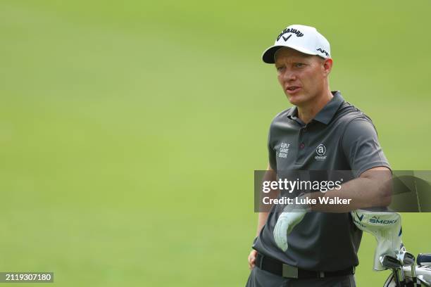 Simon Forsstrom of Sweden looks on before playing his second shot on the 10th hole during day one of the Hero Indian Open at DLF Golf and County Club...