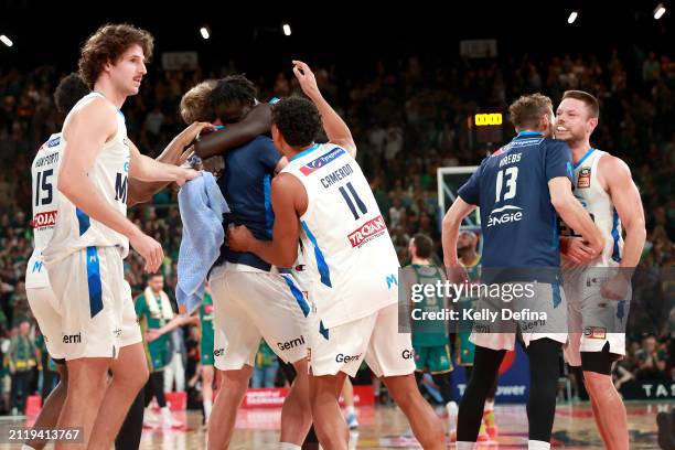 Melbourne United celebrate victory during game four of the NBL Championship Grand Final Series between Tasmania JackJumpers and Melbourne United at...