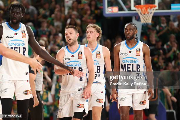 Matthew Dellavedova, Jo Lual-Acuil Jr, Luke Travers of United and Ian Clark of United react in the final minute during game four of the NBL...