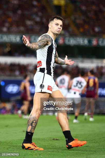 Jamie Elliott of the Magpies celebrates a goal during the round three AFL match between Brisbane Lions and Collingwood Magpies at The Gabba, on March...