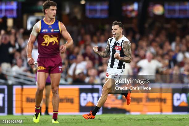 Jamie Elliott of the Magpies celebrates a goal during the round three AFL match between Brisbane Lions and Collingwood Magpies at The Gabba, on March...