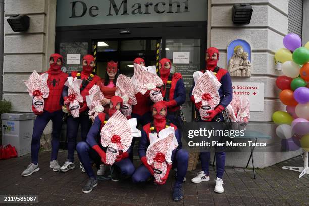 Some volunteers masked as Spiderman pose during the event of the De Marchi ETS Foundation for children in the pediatric department as they receive...