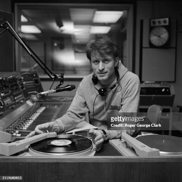 Radio DJ Charlie Gillett in a studio at Radio London, circa 1975.