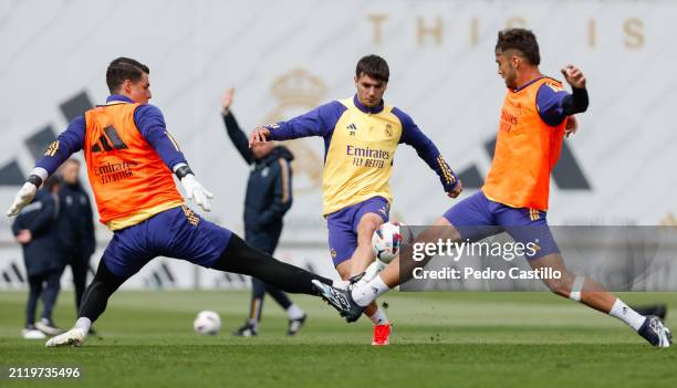 Brahim Diaz and Kepa Arrizabalaga player of Real Madrid are training at Valdebebas training ground on March 28, 2024 in Madrid, Spain.