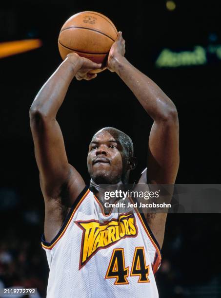 Marc Jackson, Center and Power Forward for the Golden State Warriors prepares to take a free throw shot during the NBA Pacific Division basketball...