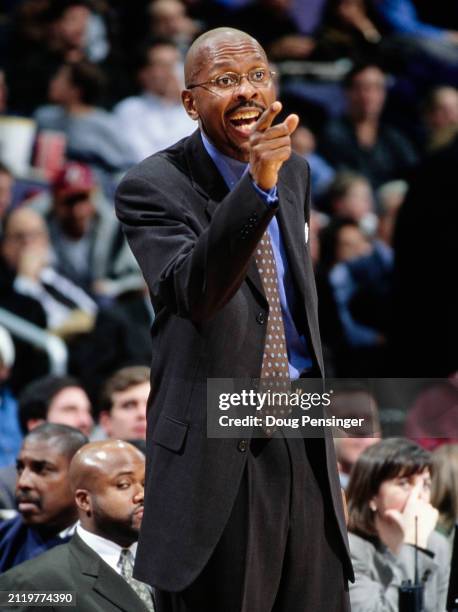 Darrell Walker, Head Coach for the Washington Wizards instructs the players from the sideline during the NBA Atlantic Division basketball game...