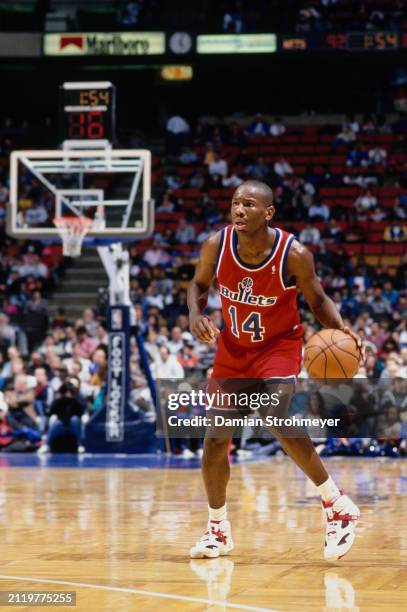 Doug Overton, Point Guard for the Washington Bullets in motion dribbling the basketball down court during the NBA Atlantic Division basketball game...