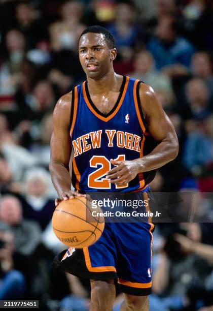 Charlie Ward, Point Guard for the New York Knicks in motion dribbling the basketball down court during the NBA Pacific Division basketball game...