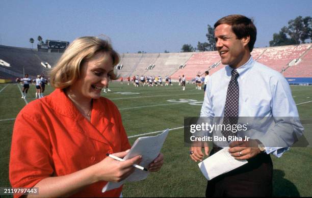 Los Angeles Times Sports Reporter Tracy Dodds interviews University of California Los Angeles Head Coach Terry Donahue after practice at Rose Bowl...