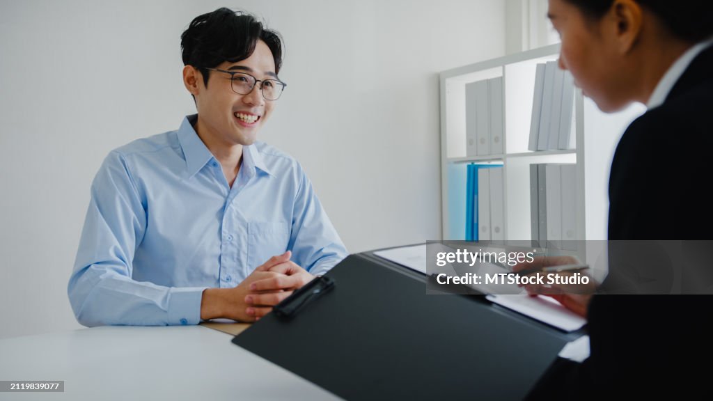 Young Asian Man Pass Job Interview Sit In Front Of Hr Manager At