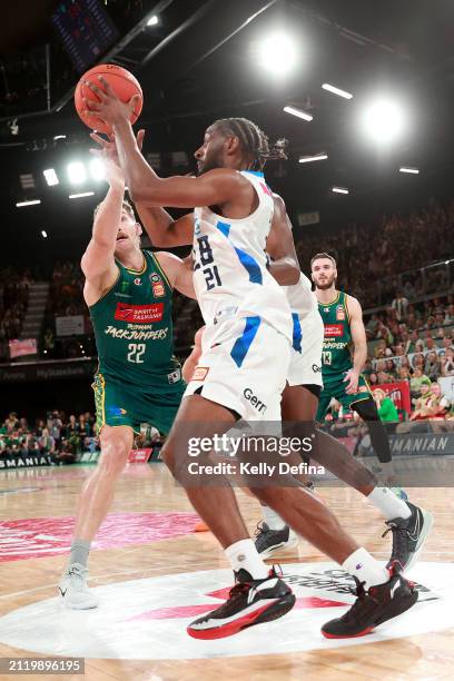 Ian Clark of United in action against Will Magnay of the JackJumpers during game four of the NBL Championship Grand Final Series between Tasmania...