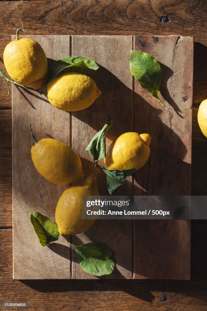 Directly above shot of lemons and leaves on table,Nommern,Luxembourg