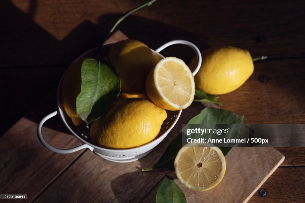 High angle view of lemons and lemons in bowl on table,Nommern,Luxembourg