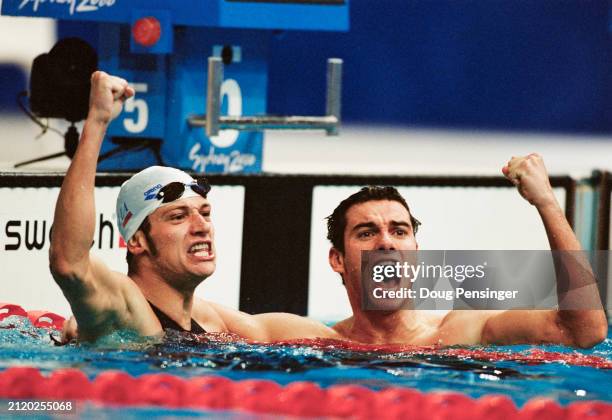 Domenico Fioravanti and Davide Rummolo from Italy celebrate finishing in first and third place in the Men's 200 metre Breaststroke competition on...