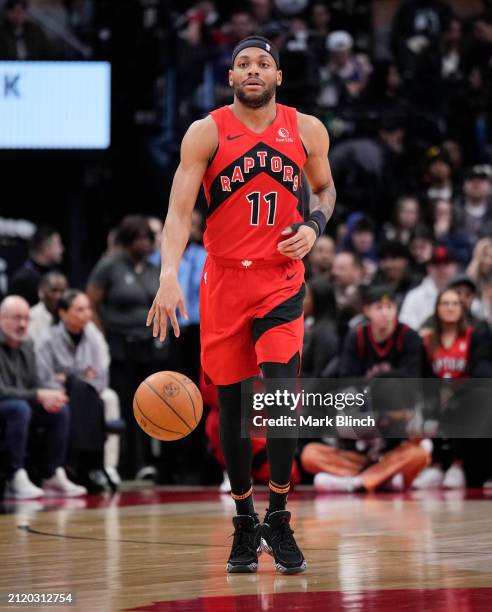 Bruce Brown of the Toronto Raptors dribbles against the New York Knicks during the second half of their basketball game at the Scotiabank Arena on...