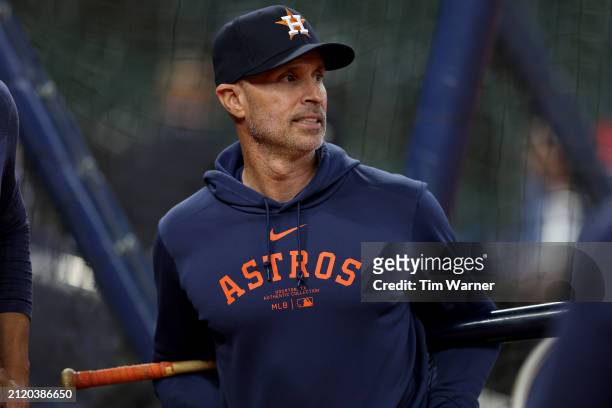 Manager Joe Espada of the Houston Astros watches batting practice before the Opening Day game against the New York Yankees at Minute Maid Park on...