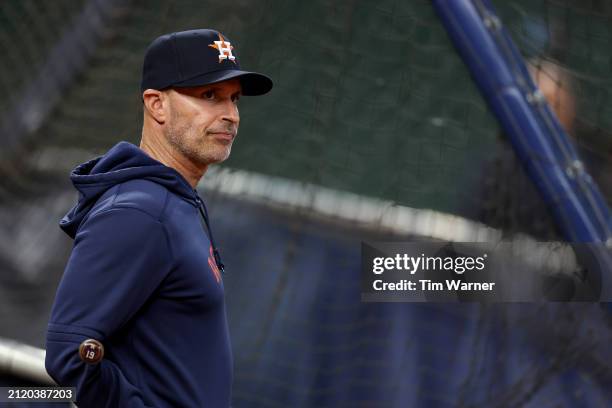 Manager Joe Espada of the Houston Astros watches batting practice before the Opening Day game against the New York Yankees at Minute Maid Park on...