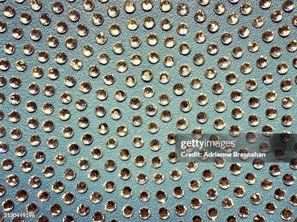 radial symmetry pattern of rhinestones - metal swatches stock pictures, royalty-free photos & images