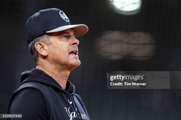 Manager Aaron Boone of the New York Yankees watches batting practice before the game against the Houston Astros at Minute Maid Park on March 28, 2024...