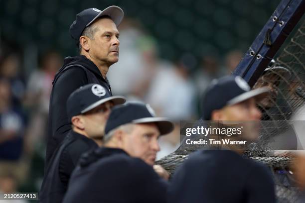 Manager Aaron Boone of the New York Yankees watches batting practice before the Opening Day game against the Houston Astros at Minute Maid Park on...