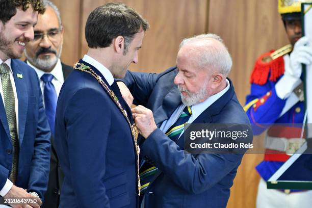 President of Brazil Luiz Inácio Lula da Silva awards President of France Emmanuel Macron with the medal "Gran Cruz Cruzeiro do Sul" after joint...