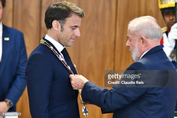 President of Brazil Luiz Inácio Lula da Silva awards President of France Emmanuel Macron with the medal "Gran Cruz Cruzeiro do Sul" after joint...