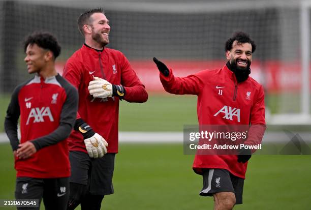 Adrian and Mohamed Salah of Liverpool during a training session at AXA Training Centre on March 28, 2024 in Kirkby, England.
