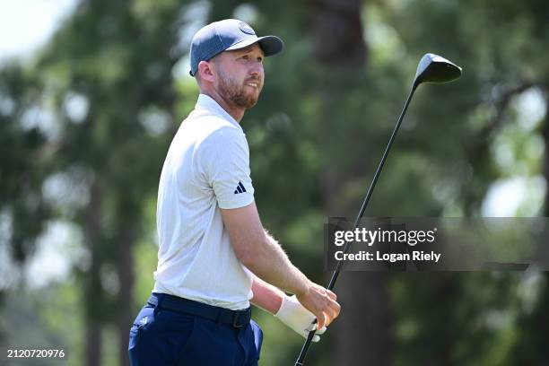 Daniel Berger of the United States hits a tee shot on the 12th hole during the first round of the Texas Children's Houston Open at Memorial Park Golf...