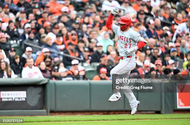 Mike Trout of the Los Angeles Angels celebrates after hitting a home run in the first inning against the Baltimore Orioles on Opening Day at Oriole...