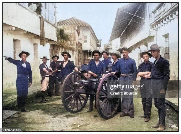 antique black and white photograph: gatling gun in cavite, philippines - big island hawaii islands stock illustrations