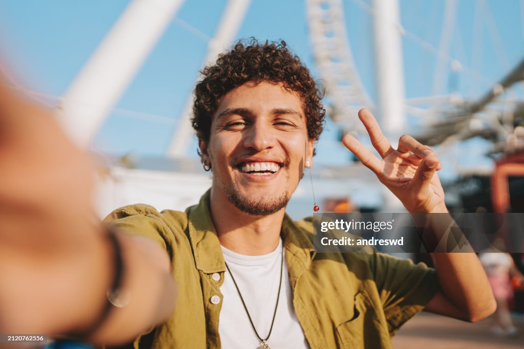 Portrait of a man taking selfie