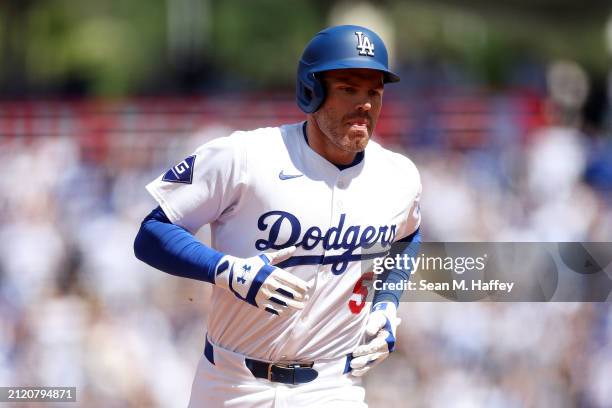 Freddie Freeman of the Los Angeles Dodgers rounds second base after connecting for a two-run homerun during the third inning of a game against the...