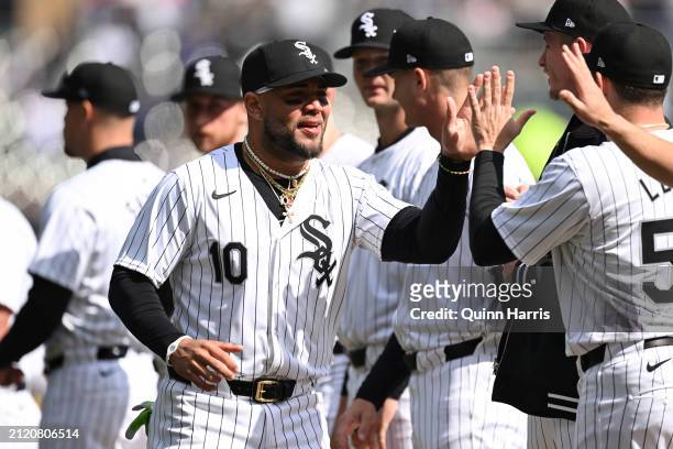 Yoan Moncada of the Chicago White Sox celebrates with teammates after being announced before the Opening Day game against the Detroit Tigers at...